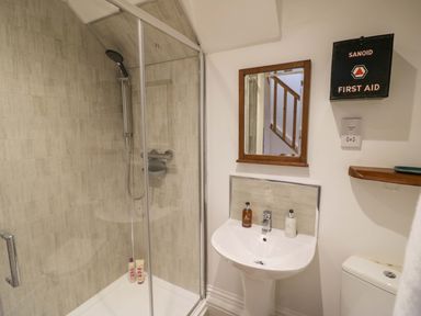 A bathroom with a shower and sink at Flat 4 in Evesham