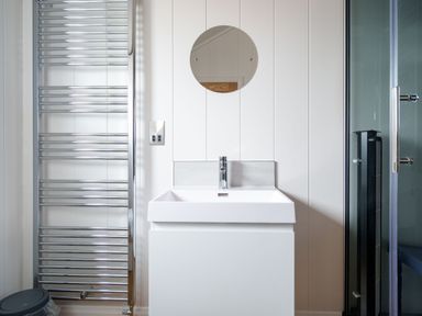 A bathroom with a sink and towel radiator at The Grays in North Berwick