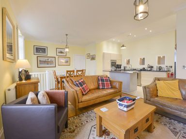 A living room with a coffee table and sofas at The Old Signal House Torpoint