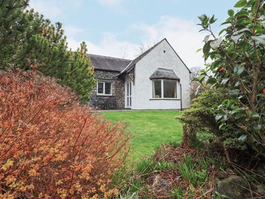 A house with a garden and plants at Thrang View Chapel Stile