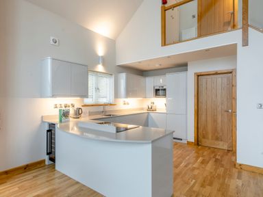 A kitchen with cabinets and appliances at Tranquillity 4 (Pet) in Carnforth