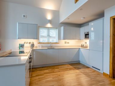 A kitchen with cabinets and sink at Tranquillity 4 (Pet) Carnforth