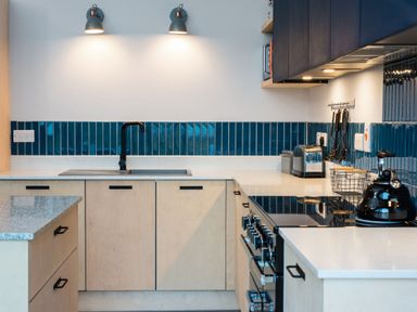 A kitchen with a sink and stove at The Telfer in North Berwick