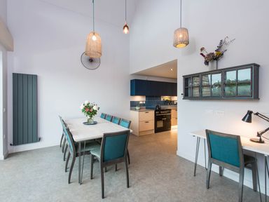 A dining room with a table and chairs at The Laidlaw in North Berwick