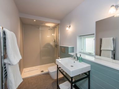 A bathroom with shower and washbasin at The Laidlaw in North Berwick