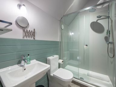 A bathroom with a shower, sink, and toilet at The Laidlaw in North Berwick