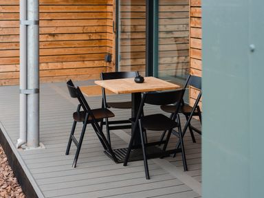 A table with chairs on a patio at The Laidlaw in North Berwick