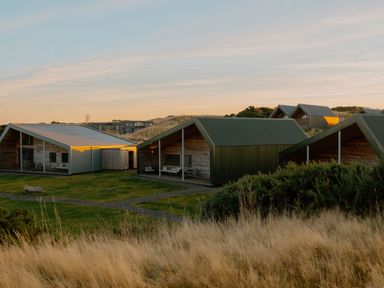 A group of modern houses with a path and grass at The Laidlaw in North Berwick