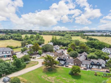 An aerial view of houses and green landscape at Kynance Spa in Bude