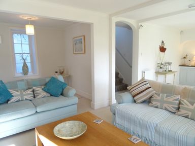 A living room with sofas and a coffee table at Mount Pleasant in Padstow