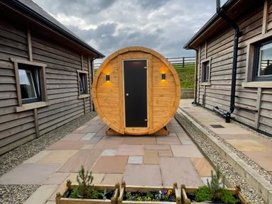A wooden cabin structure in the outdoor area at Valley View Lodge 1 Preston