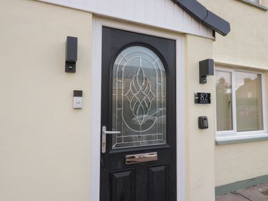 An entrance door with a decorative design at Mables in Wigton