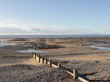 A beach with sand and water at Mables in Wigton
