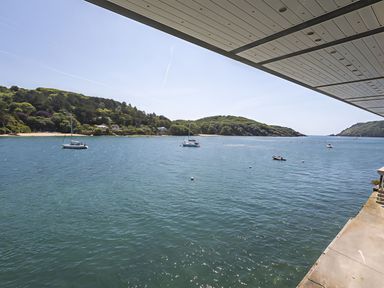 A view of water with boats and hills at Villa 8, Estura in Salcombe