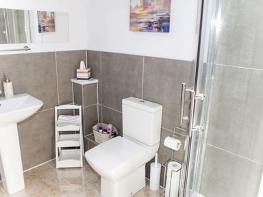 A bathroom with a sink and toilet at The Granary in Durham