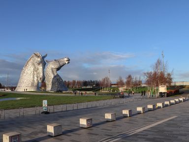 Horse sculptures in a park with visitors at Beechtree Timber Lodge 69B Denny