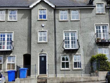 A building with balconies and fences at 17 Castleview in Ballymena