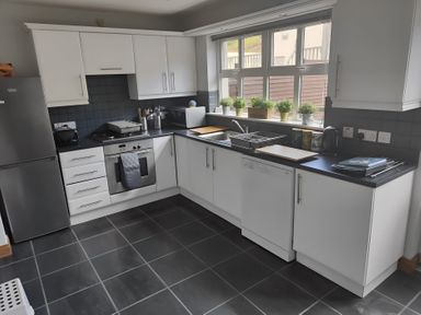A kitchen with appliances and countertop at 17 Castleview in Ballymena