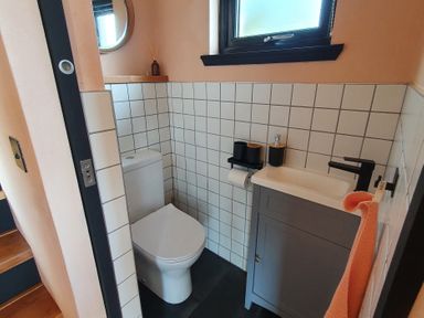 A bathroom with a toilet and sink at Cullinview Isle of Skye