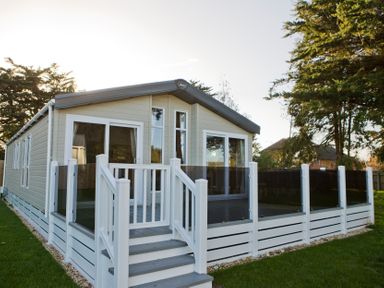A house with steps and railing at Orchid 9 in Christchurch