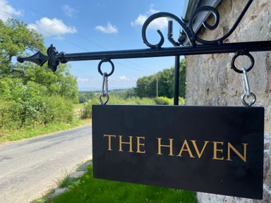 A sign that reads THE HAVEN outdoors at The Haven in Penrith