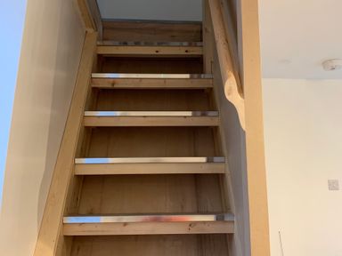 Stairs with a handrail at The Haven in Penrith