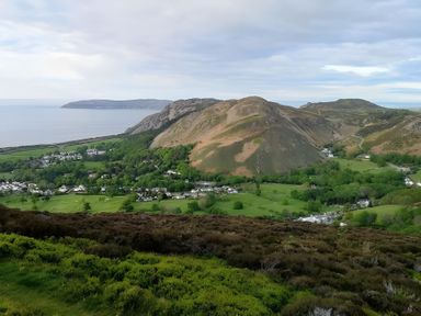 A view of hills and ocean at Sea view cottage in Penmaenmawr