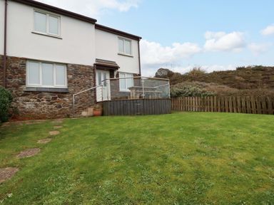 A house with decking and garden at Poldreth in Truro