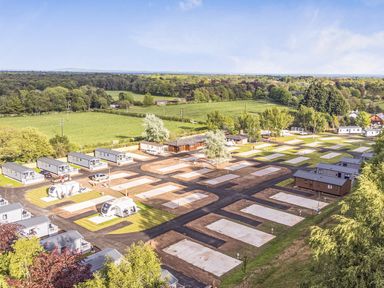 An outdoor area with caravans and vacation homes at The Oaks 2 Bedrooms in Delamere