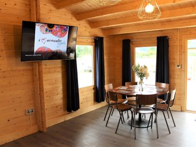 A dining room with a table and chairs at Cotswold Nights Away in Evesham