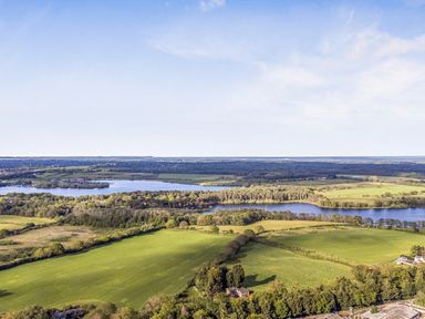 A landscape view with fields and lakes at Cedar Lodge 3 Bedrooms with hot tub Delamere