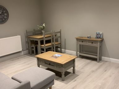 A dining area with a table and chairs at 43 Goose Green Road in King's Lynn