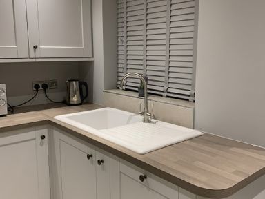 A kitchen with a sink and kettle at 43 Goose Green Road King's Lynn