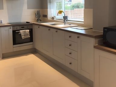 A kitchen with an oven and sink at 15 Lamsey Lane King's Lynn