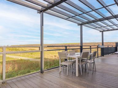 An outdoor dining area with a table and chairs at 114 - The Residance in Redruth