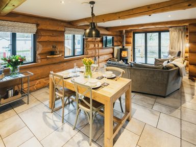 A dining room with a table and chairs at The Lookout in Addingham
