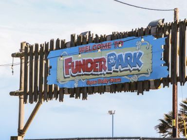 A welcome sign for Funder Park open daily at 10am at Upper Longlands, Dawlish