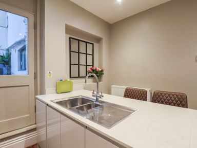 A kitchen with a sink and countertop at South Villa Sandsend near Whitby