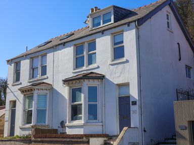 A house with windows and a door at South Villa in Sandsend near Whitby