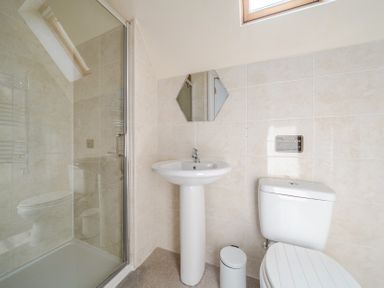 A bathroom with a shower and basic fixtures at James Ville Marina Lodge 9 in Brigg