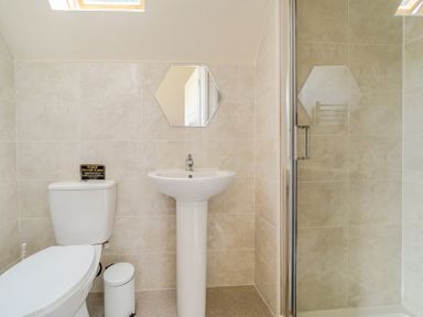 A bathroom with a toilet and sink at James Ville Marina Lodge 13 in Brigg