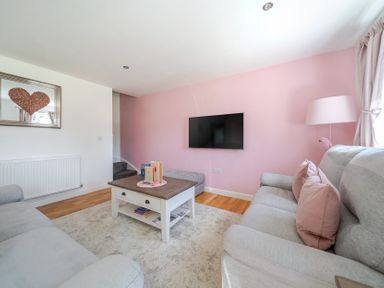 A living room with a sofa and coffee table at James Ville Marina Lodge 23, Brigg