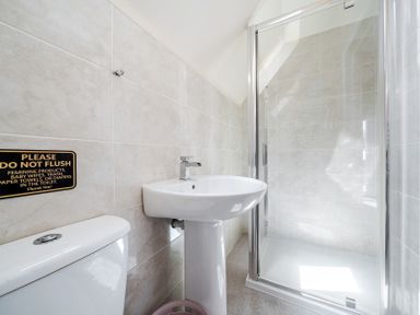 A bathroom with a sink and shower at James Ville Marina Lodge 23 in Brigg