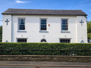 A building with windows and a door at Picton House near St Clears