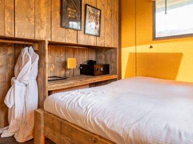 A bedroom with a bed and robe in Kruger (Pet) Penrith