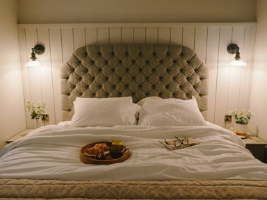 A bedroom with a bed and breakfast tray at Wansfell (Pet) Penrith