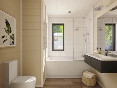 A bathroom with a bathtub and sink at Lonscale (Pet) Penrith