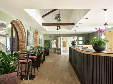 A lobby with a bar counter and seating area at Lonscale (Pet) Penrith