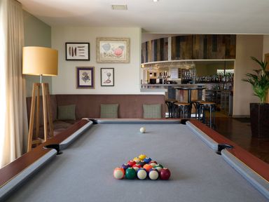 A snug with a pool table and a bar at Lonscale (Pet) Penrith