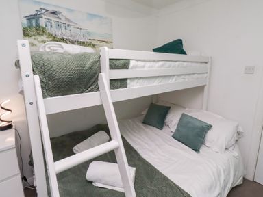 A bunk bed with a lower bed made at Harper's Hideaway near Felmoor Holiday Park near Felton
